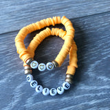 Orange Vinyl ‘Believe’ Bracelet